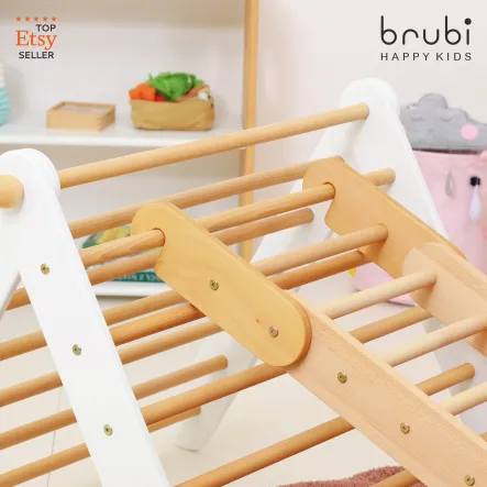 Scandi style Montessori climbing triangle with white side panels and natural beech wood rungs