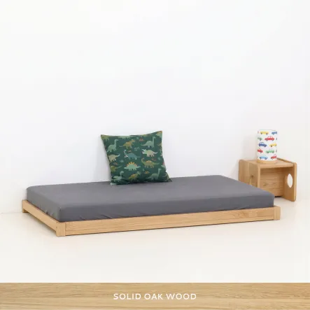 Low wooden toddler bed frame with open entrance side, Montessori style